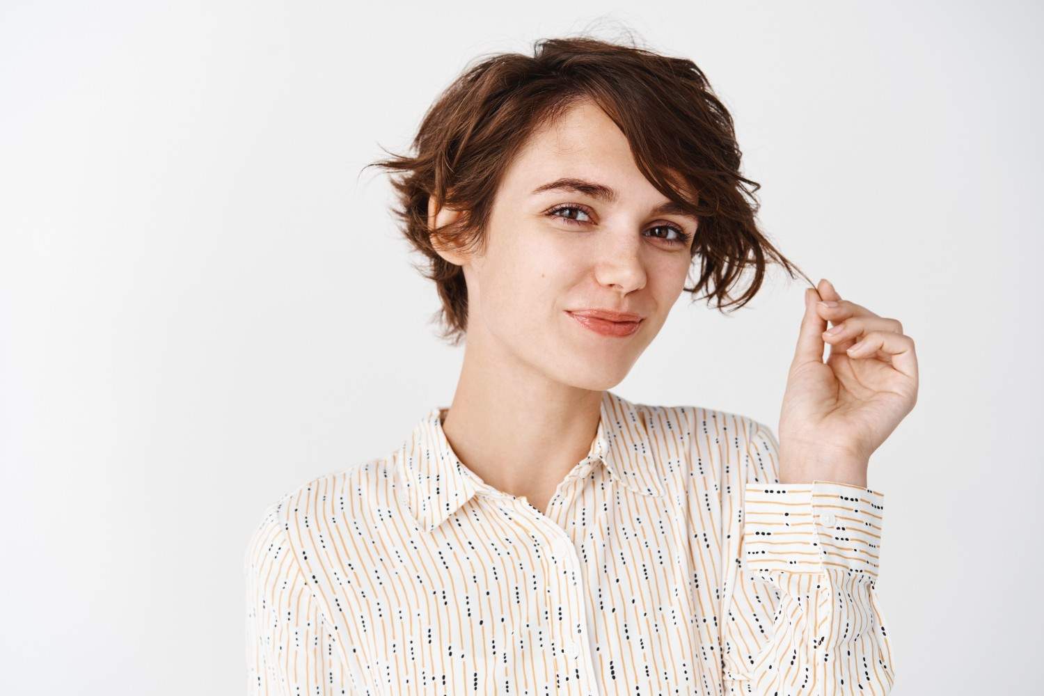 Long Pixie With Side-Swept Bangs Offers Versatile Softness